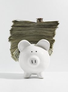 piggy bank with stack of money