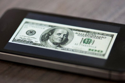 image of 100 dollar bill on smartphone